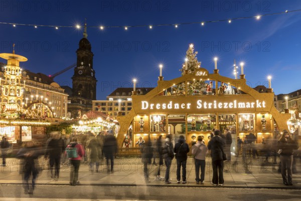 Large walk-in light arch at the entrance to Striezelmarkt, Germany's oldest Christmas market, with