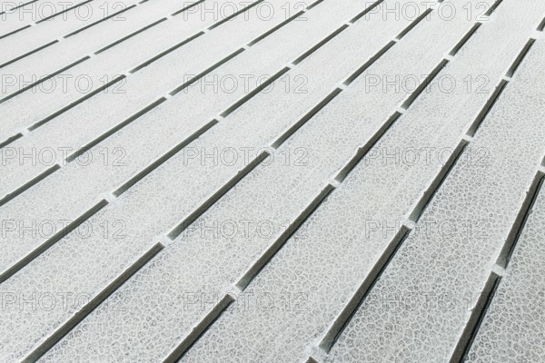 Close-up view of geometric salt formations at Salinas Grandes in Salta, Argentina. The surface