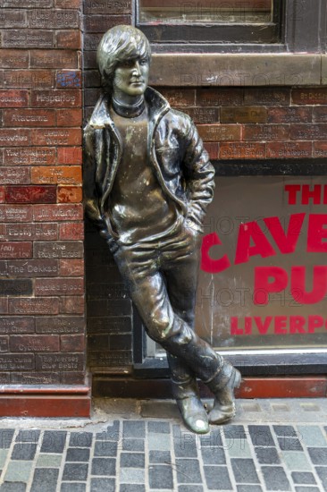 Statue sculpture of John Lennon of the Beatles, Mathew Street, Liverpool, Merseyside, England, UK