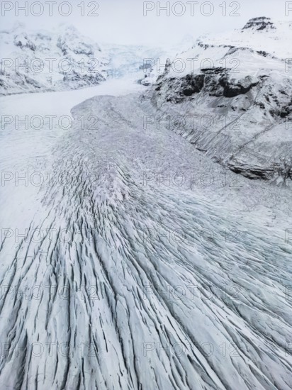 Aerial view of the stunning Icelandic winter landscape, showcasing remote, wild nature with