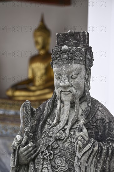 Stone statue of a Chinese warrior, guardian, Wat Pho, Temple of the Reclining Buddha, Bangkok,