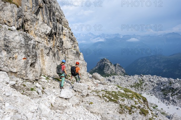 Climbers on a hiking trail, rocky mountain landscape, Via Ferrata SOSAT via ferrata, Brenta