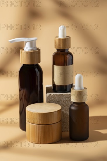 A selection of cosmetic bottles with wooden caps on a beige background. The earthy tones and