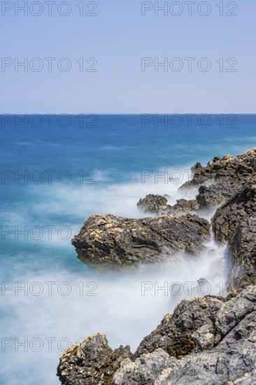Romantic view over the sea in Koromacna Bay on a sunny day with rough seas on the island of Cres,