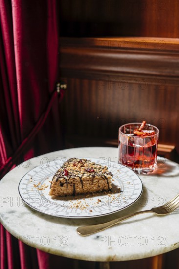 A delectable waffle cake layered with creamy truffle condensed milk, topped with chocolate drizzle,
