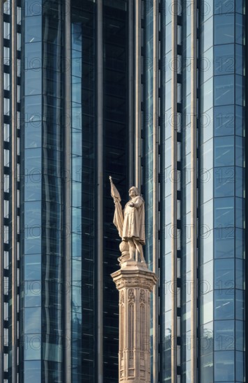 A striking display of architectural contrast in Colon City, Panama, showing a historic statue