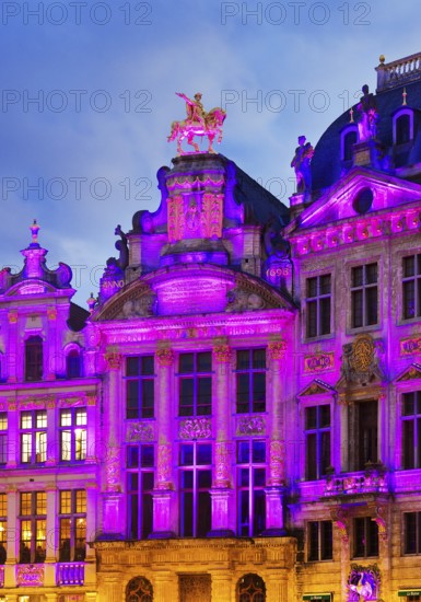 The illuminated golden horseman Charles de Lorraine on the guildhall L'Arbre d'Or, Guild of
