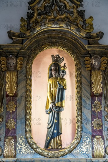 The Miraculous Black Madonna in the interior of the baroque Carmelite Church of St Joseph in