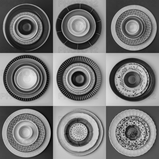 Monochrome plates and bowls with diverse geometric patterns form a striking arrangement in a grid.