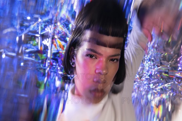A futuristic Latin woman is immersed in the metaverse. Surrounded by prismatic lights and digital