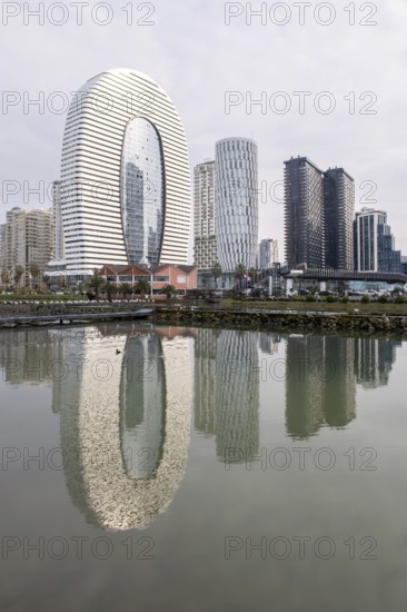 Stunning view of modern highrise architecture in Batumi, Georgia, with sleek buildings reflecting