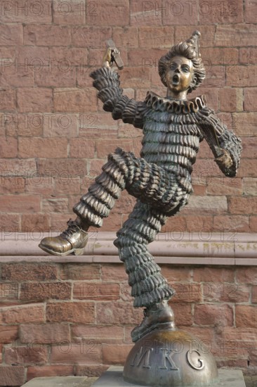 Sculpture of the Mainzer Klepper-Garde, jester with ruff on ball with inscription MKG, carnival