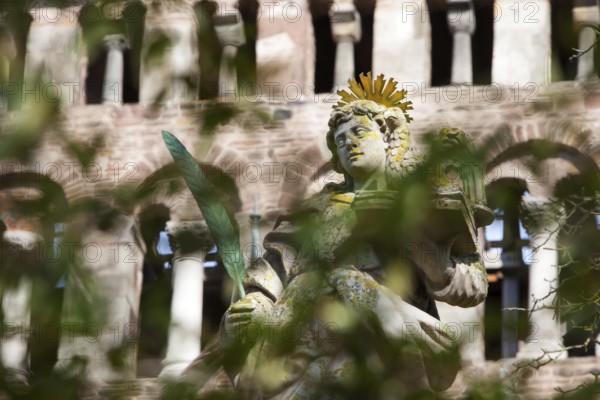 An angel in front of the abbey church St. Stephanus and St. Vitus, Abbey Castle Corvey in Hoexter,