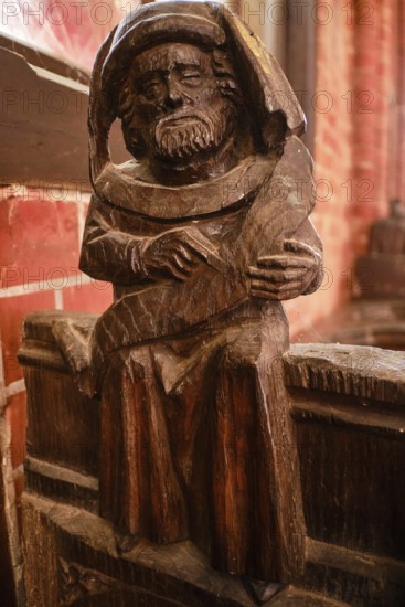 Carved wooden figures on Gothic choir stalls, Nikolaikirche Hanseatic City of Wismar,