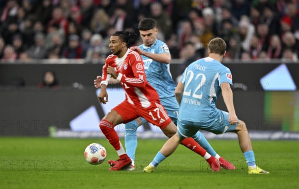 Duel, action Michael Olise FC Bayern Munich FCB (17) against Alexander Prass TSG 1899 Hoffenheim