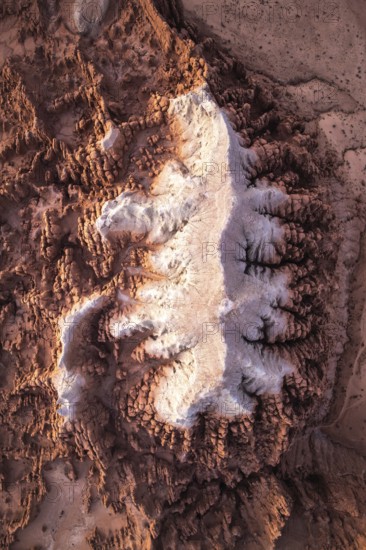This stunning aerial image captures the intricate, textured sandstone formations of Goblin Valley