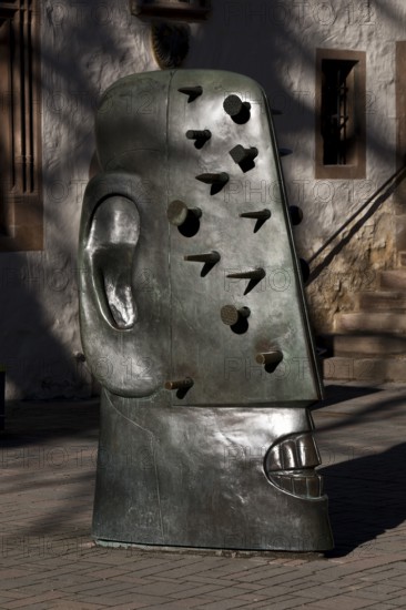 Bronze sculpture Goslarer Nagelkopf by Rainer Kriester at the town hall, Goslar, Lower Saxony,