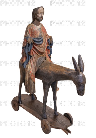 Palm tree donkey, wooden figure from around 1380, painted on a dark background, Hohenzollerisches