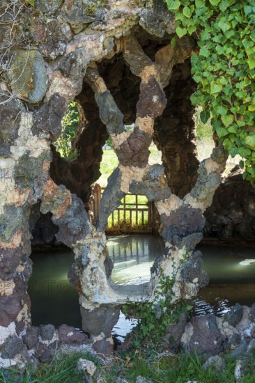 Well-sheltered Valois Spring or Cave Spring in the ancient thermal park. Sainte Marguerite, Saint