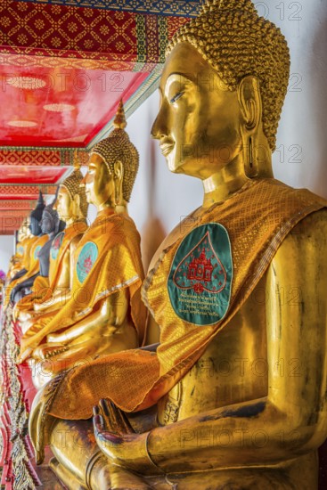 Historic Buddha statues at Wat Pho Temple, sitting, seated, Buddhism, religion, world religion,