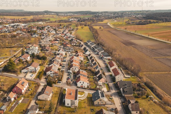 Aerial view of a residential development in a rural area with extensive fields, Ötisheim, Enzkreis,