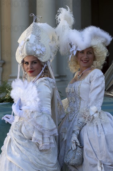 Costume wearers at the Venetian Fair, in the castle courtyard, Ludwigsburg, Baden-Württemberg,