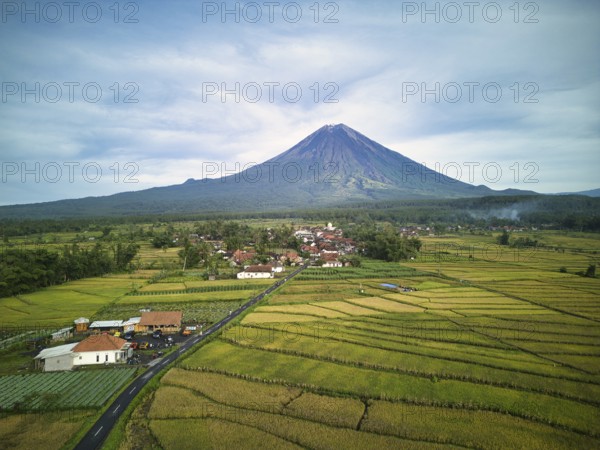 A breathtaking aerial view of Mount Semeru, the highest volcano on Java, and its surrounding