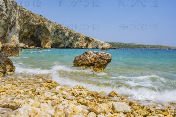 Romantic view over the sea in Koromacna Bay on a sunny day with rough seas on the island of Cres,