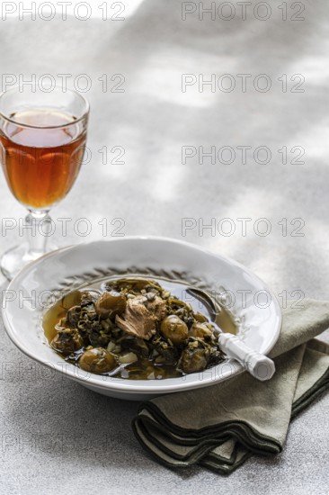 Traditional Chakapuli, a Georgian dish of stewed lamb with tarragon, coriander, green onion, and