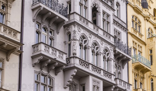 Detailed view of historic Prague facades, showcasing intricate designs and architectural elegance.