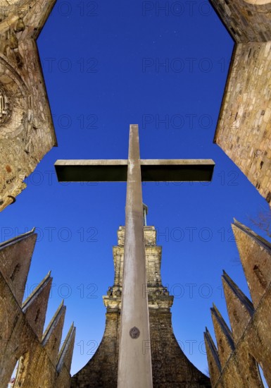 Aegidienkirche with apsis cross in the evening, not rebuilt, memorial to the victims of war and