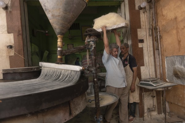 Rosetta, Egypt. June 27th 2024 Preparation of filo dough to make Egyptian Knafeh and Qatayef a