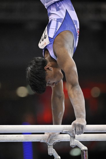 Uzair Chowdury GBR parallel bars action gymnastics, EnBW DTB-Pokal, Porsche-Arena, Stuttgart,
