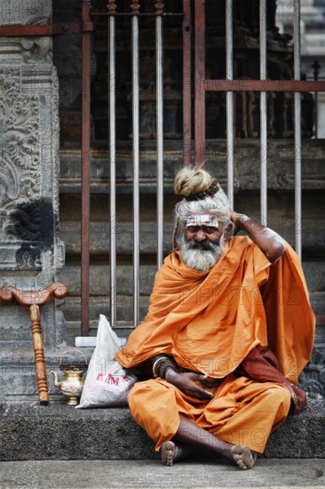 TIRUVANAMALLAI, INDIA, JANUARY 7, 2010: Sadhu, religious ascetic or holy person, in Hindu temple