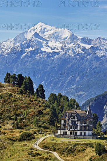 Pro Natura Centre Villa Cassel, snow-covered Alps in the background, Unesco World Heritage Site