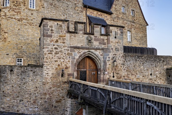 Castle wall with gate and bridge in medieval style, robust and fortified, The gate of Spangenberg