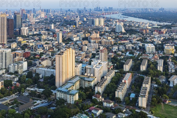 Over the rooftops of Bangkok, view from the Moon Bar on the roof terrace of the Banyan Tree Hotel,