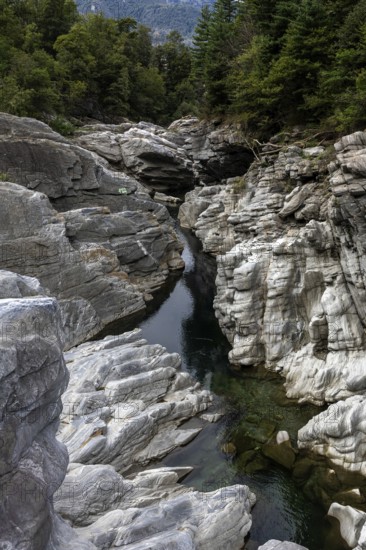 Rocks, granite rock formations in the Maggia River near Ponte Brolla, in the Maggia Valley, Valle