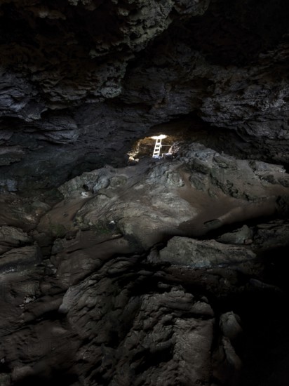 La Cova Foradada cave at the Far de Cap de Barbaria lighthouse on the southern tip of Formentera,