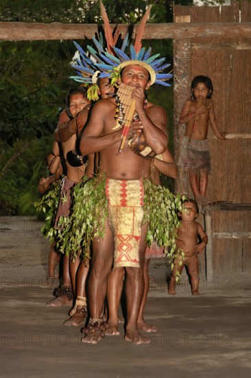Traditional tribal dance from the Dessanos tribe with face paintings and wearing a traditional hat