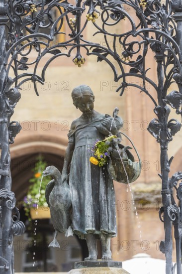 The Gänseliesel fountain is a market and ornamental fountain on the market square in front of the