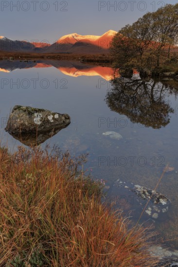 Mountains reflected in lake, morning light, morning mood, still, autumn, snowy, Lochan na