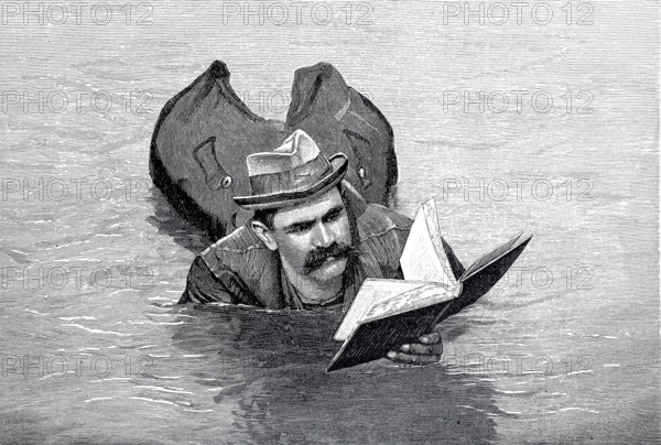 The technician F.W. Kuhl swimming down the Rhine near Cologne in the life jacket he invented, 1896,