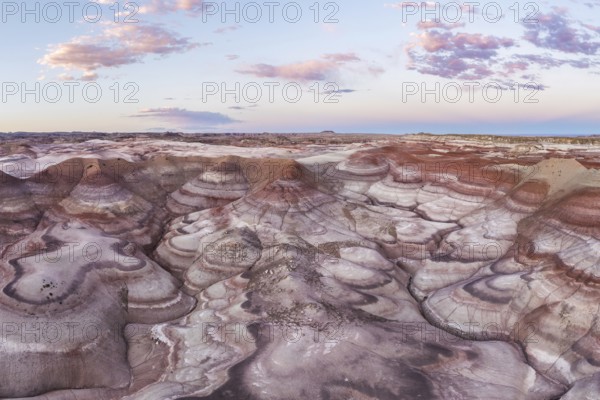 Stunning aerial shot capturing the unique patterns and vibrant earth tones of bentonite landscapes