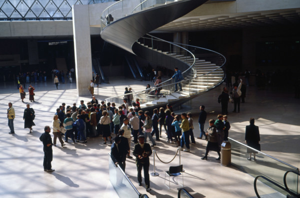 Spiral staircase beneath the Louvre Museum glass pyramid