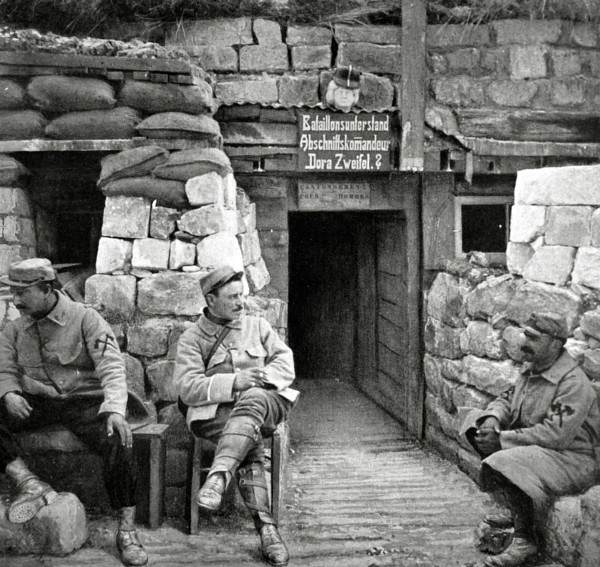 French firemen in front of a German underground post in Carency