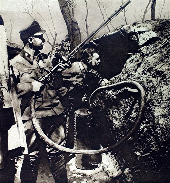 Austrian soldiers on the eastern front preparing to throw burning liquids
