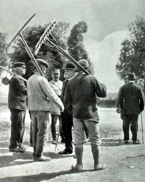French President Clemenceau talking with farmers, 1918