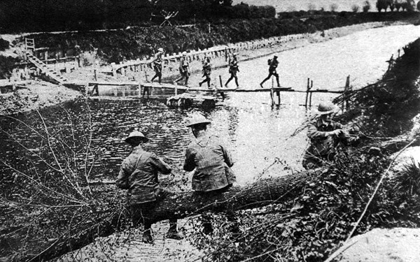 World War I. Canadians crossing a footbridge over the Ancre (Somme front)
