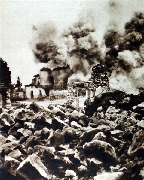 World War I. A German 210-mm shell falling on a church in the Meuse (1915)